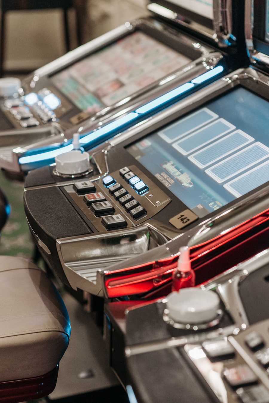 Casino slot machines in a row, illustrating the Starburst slot Canada players spin